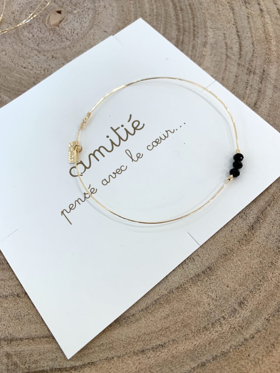 Shop Online Bracciale fino in filo oro con perline nere Amitié