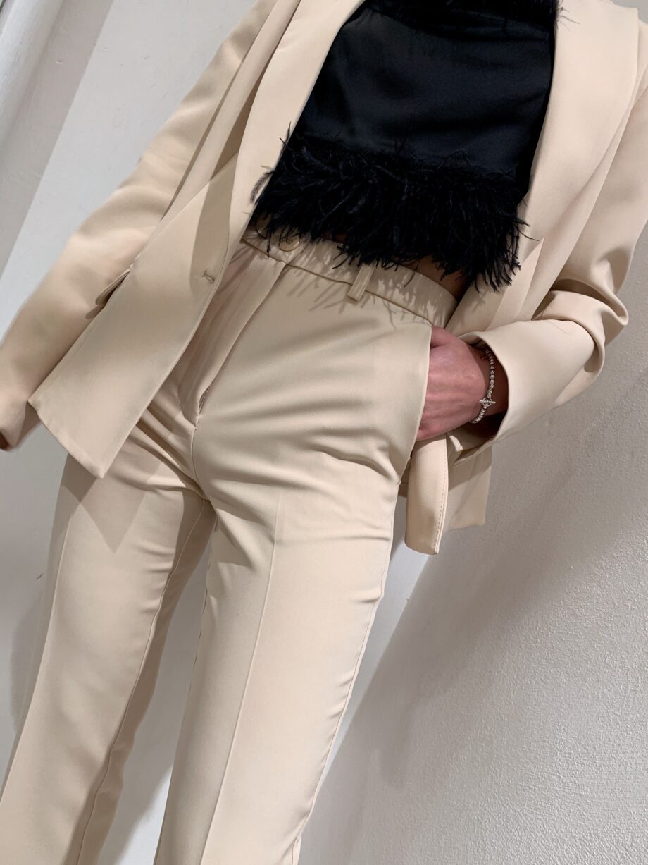 Shop Online Pantalone beige a zampa Vicolo