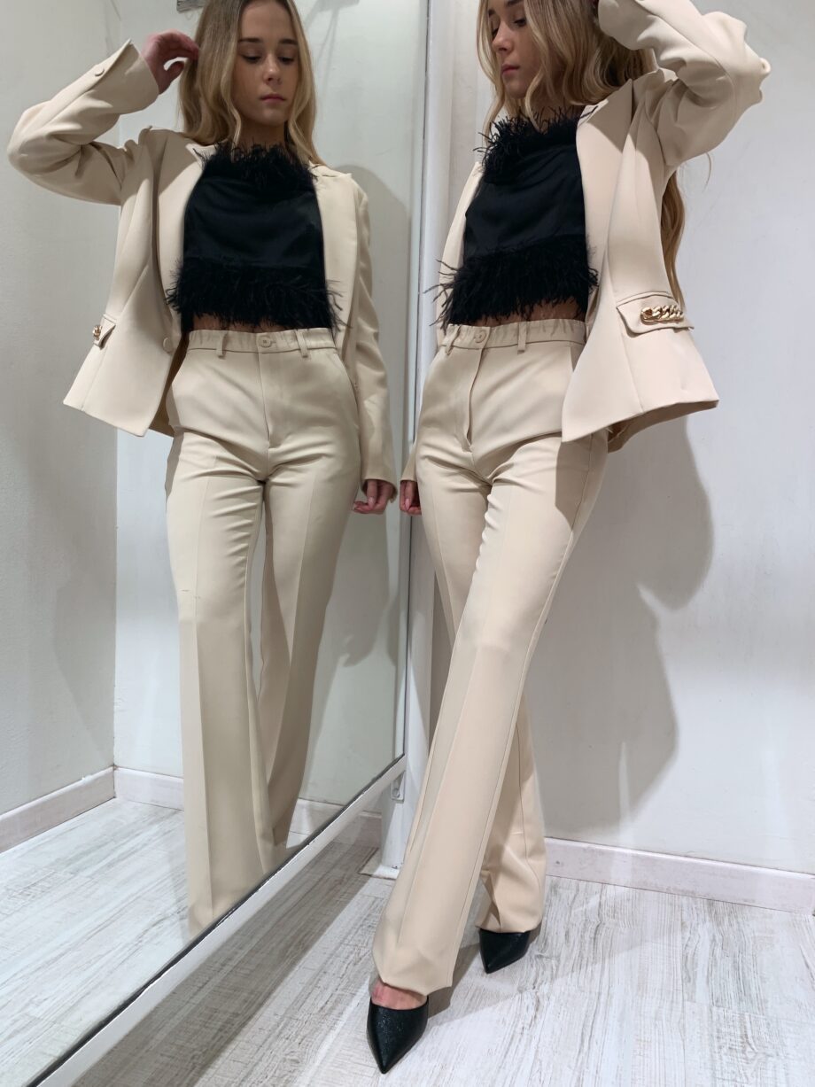 Shop Online Pantalone beige a zampa Vicolo