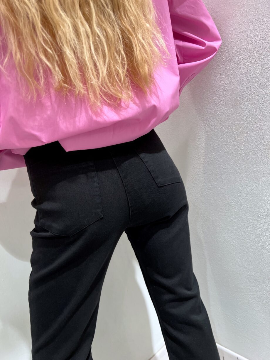Shop Online Jeans nero a zampetta con piume sul fondo HaveOne