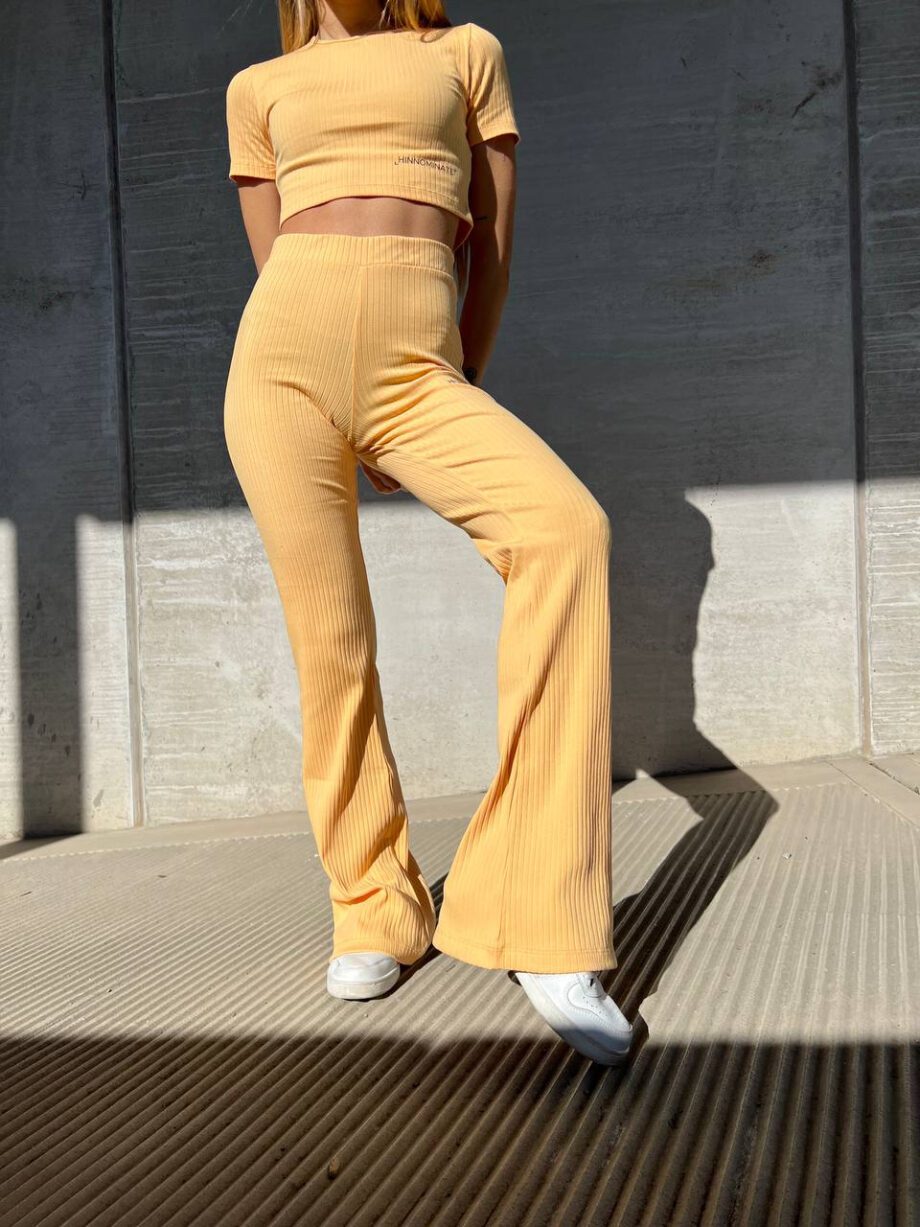 Shop Online Pantalone in maglia arancio a coste Hinnominate