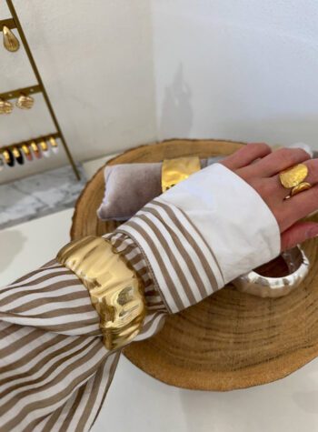 Shop Online Bracciale rigido martellato stondato oro