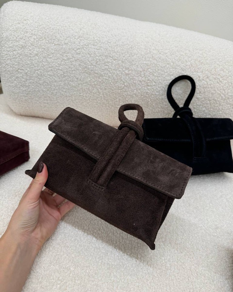Pochette moro in camoscio con manico intrecciato Shop Online Pochette moro in camoscio con manico intrecciato
