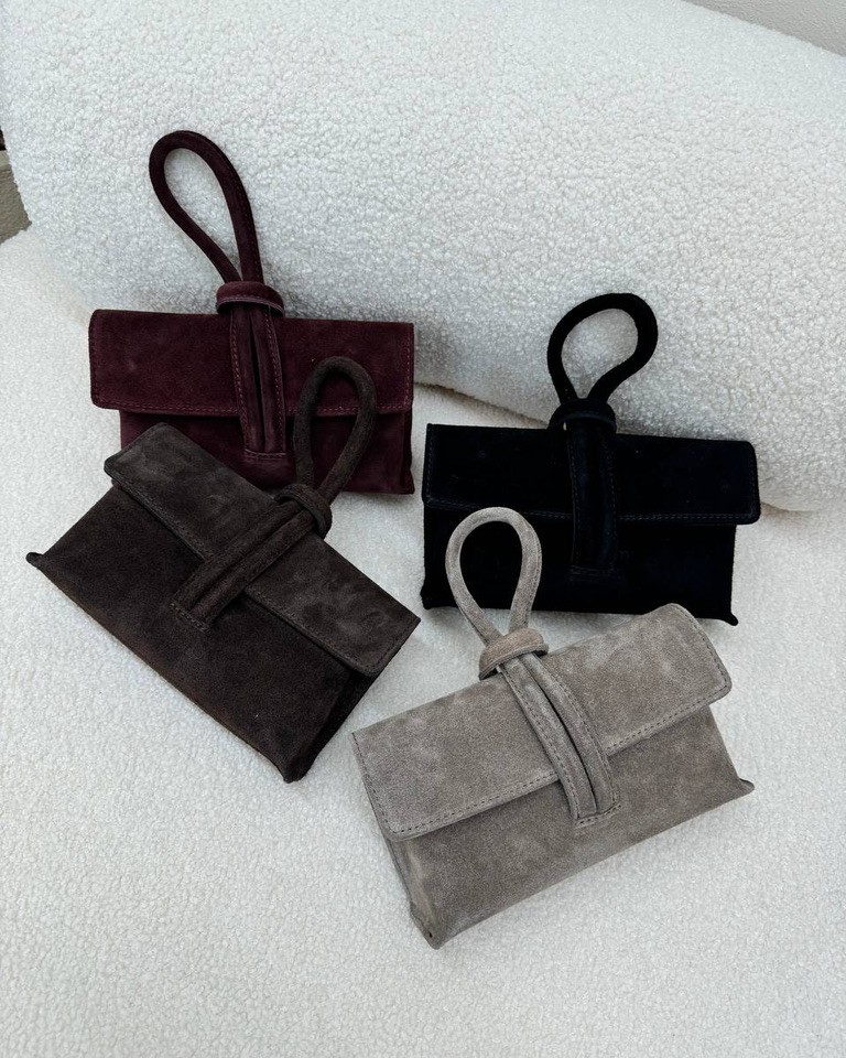 Pochette bordeaux in camoscio con manico intrecciato Shop Online Pochette bordeaux in camoscio con manico intrecciato