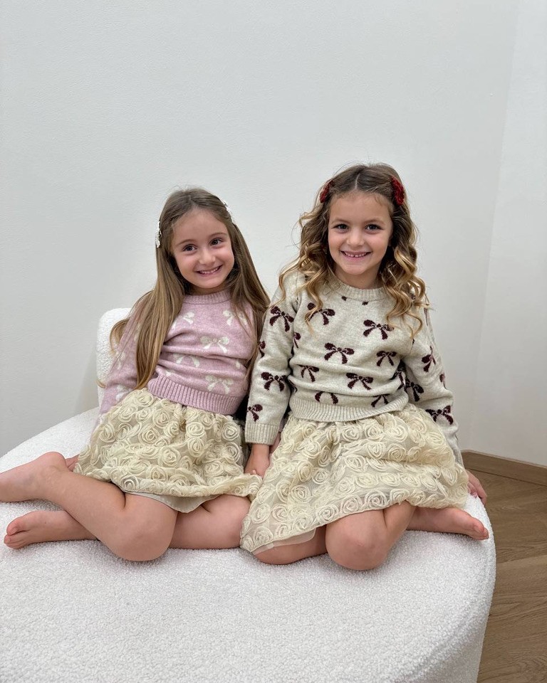 Maglione rosa girocollo con fiocchi burro Name It Shop Online Maglione rosa girocollo con fiocchi burro Name It