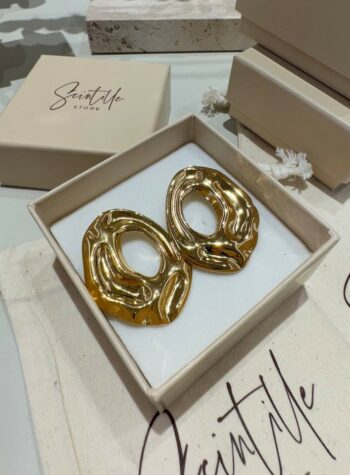 Shop Online Orecchini ovali ondulati dorati