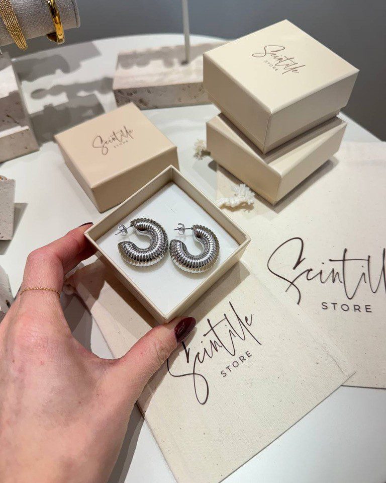 Orecchini a campanella rigati argentati Shop Online Orecchini a campanella rigati argentati