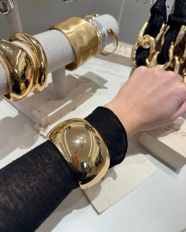 Bracciale dorato a fascia larga bombata Shop Online Bracciale dorato a fascia larga bombata