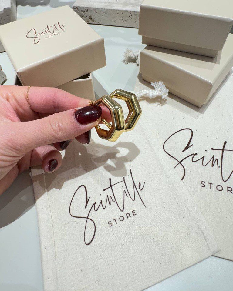 Orecchini dorati a campanella geometrica Shop Online Orecchini dorati a campanella geometrica